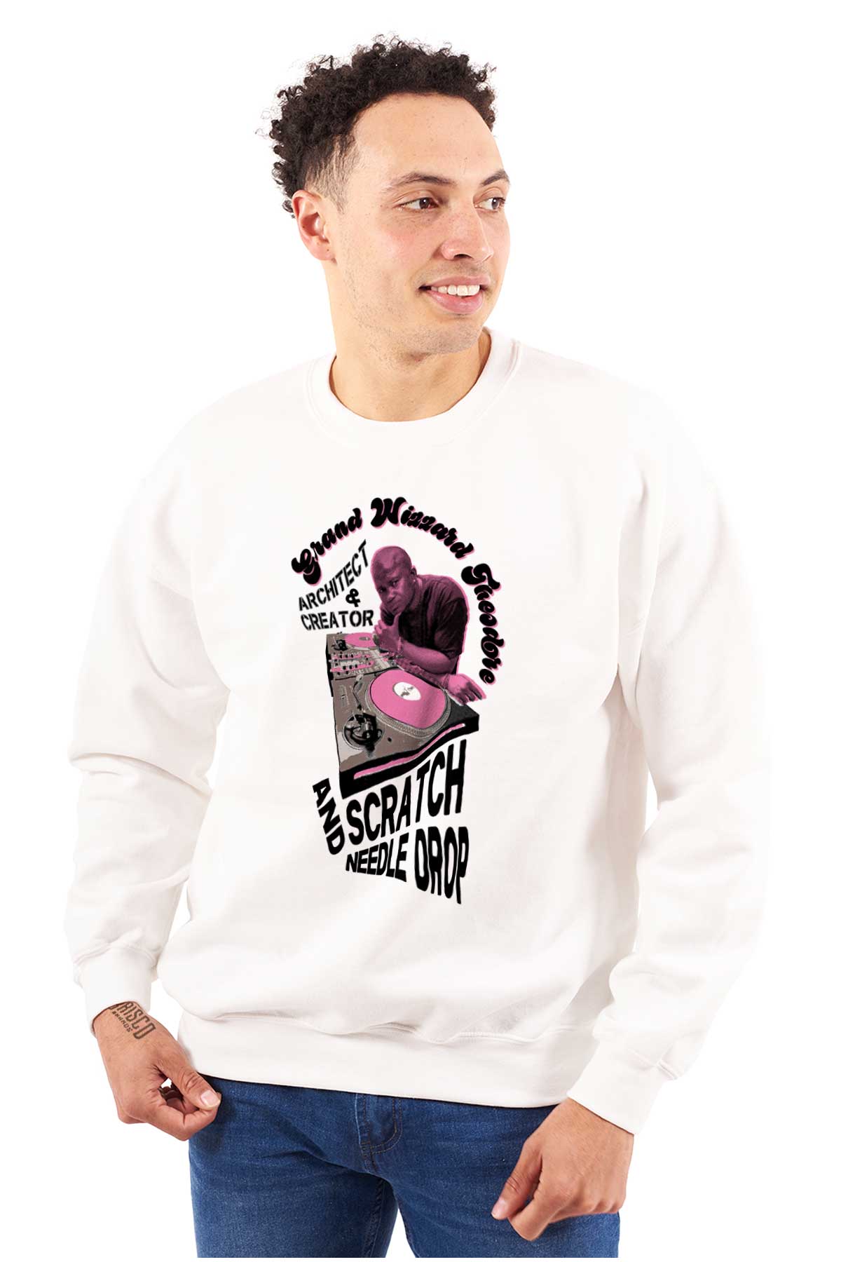 This design honors Grand Wizzard Theodore, a hip-hop pioneer, as he relaxes at his DJ Booth surrounded by text representing the greatness of hip-hop culture.