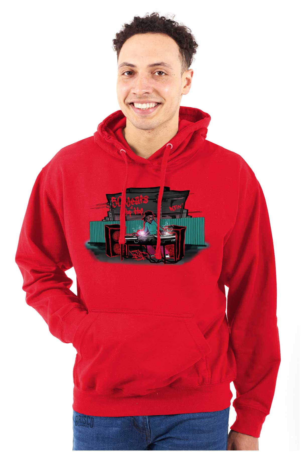 This shirt features a design inspired by urban art with a DJ mixing music and speakers playing. It's a celebration of 50 years of hip-hop and pays homage to its roots.