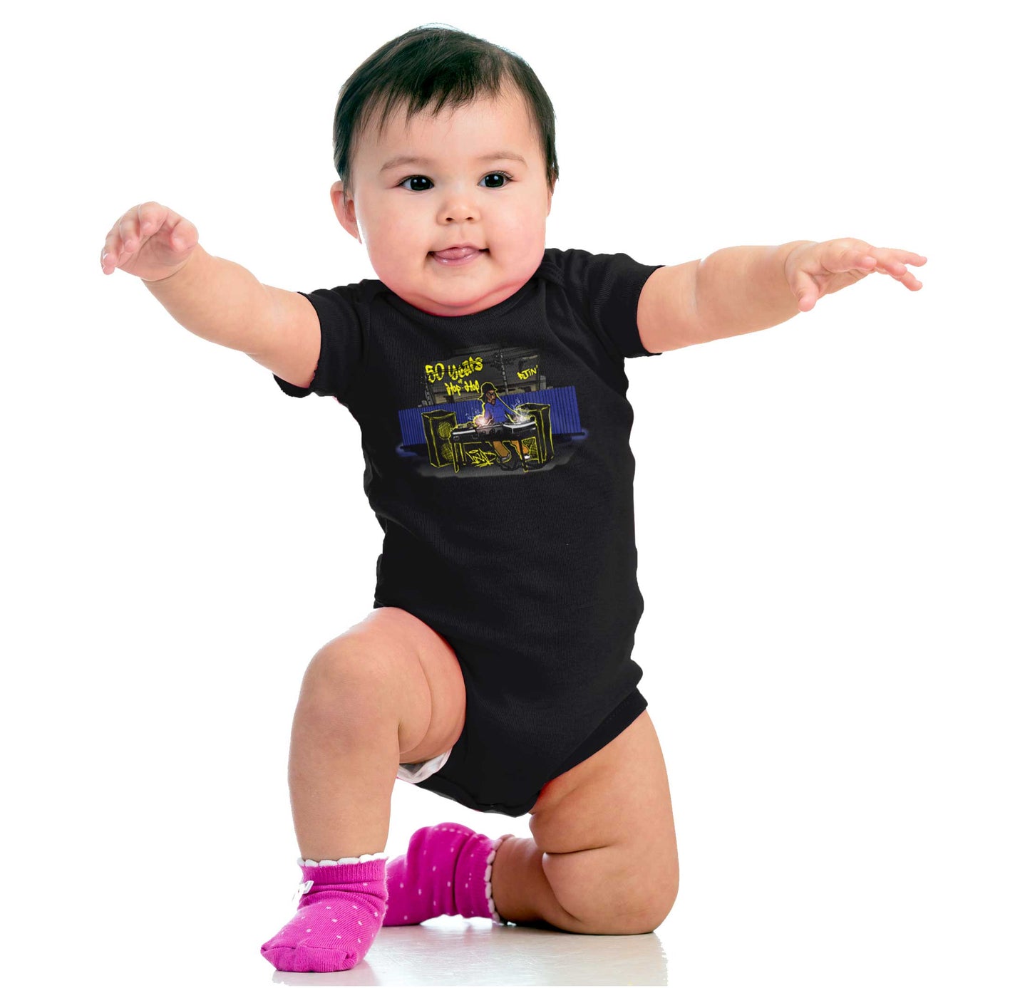 This shirt features a design inspired by urban art with a DJ mixing music and speakers playing. It's a celebration of 50 years of hip-hop and pays homage to its roots.