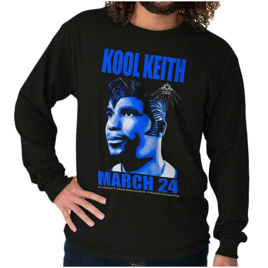 Kool Keith is seen wearing a black Elvis headpiece, symbolizing defiance and originality in fashion, capturing the essence and celebration of Hip Hop's unique style and diverse influences.