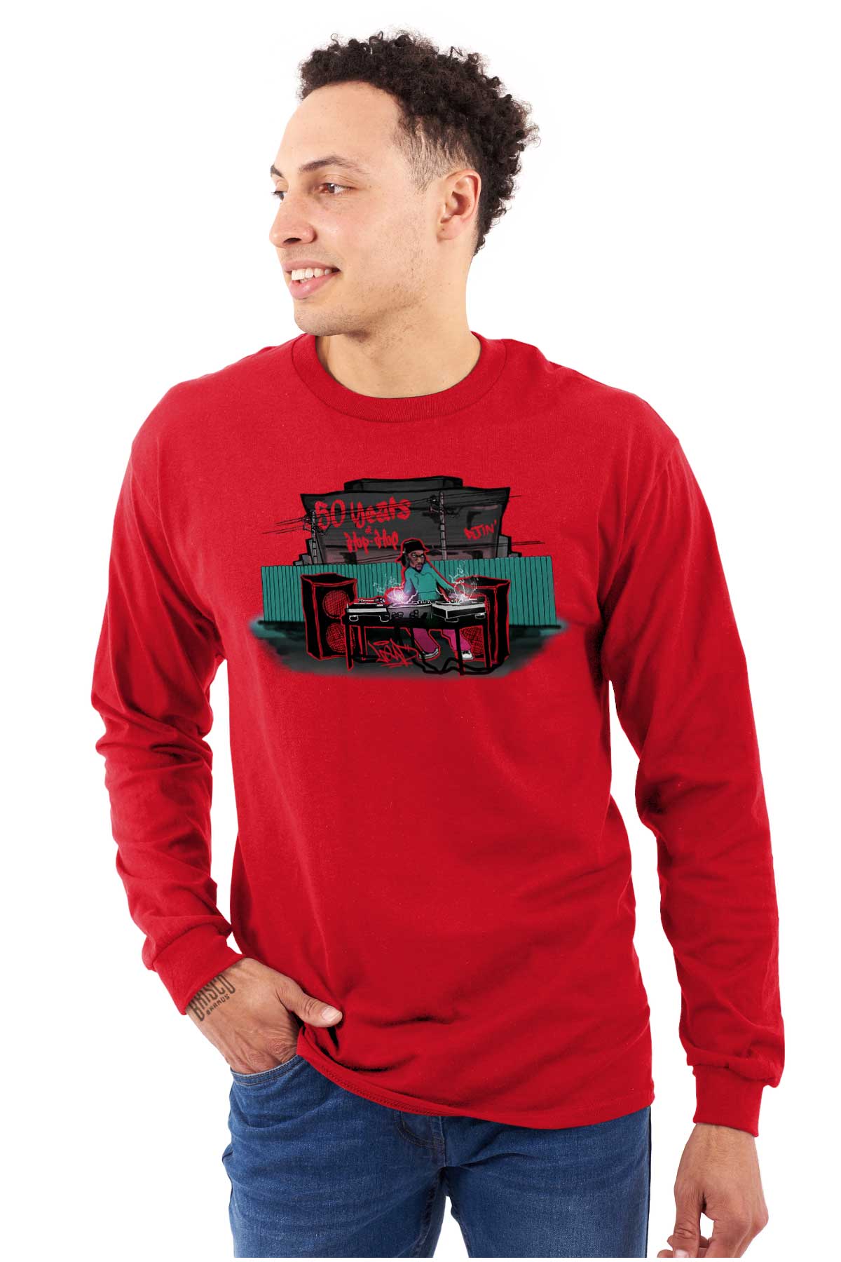 This shirt features a design inspired by urban art with a DJ mixing music and speakers playing. It's a celebration of 50 years of hip-hop and pays homage to its roots.