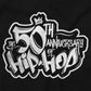 This image celebrates the 50th anniversary of hip hop with graffiti art. It is a burst of vibrant colors that captures the raw energy and creativity of the genre. The design reflects the soul of hip-hop and highlights its rich history and legendary artists.