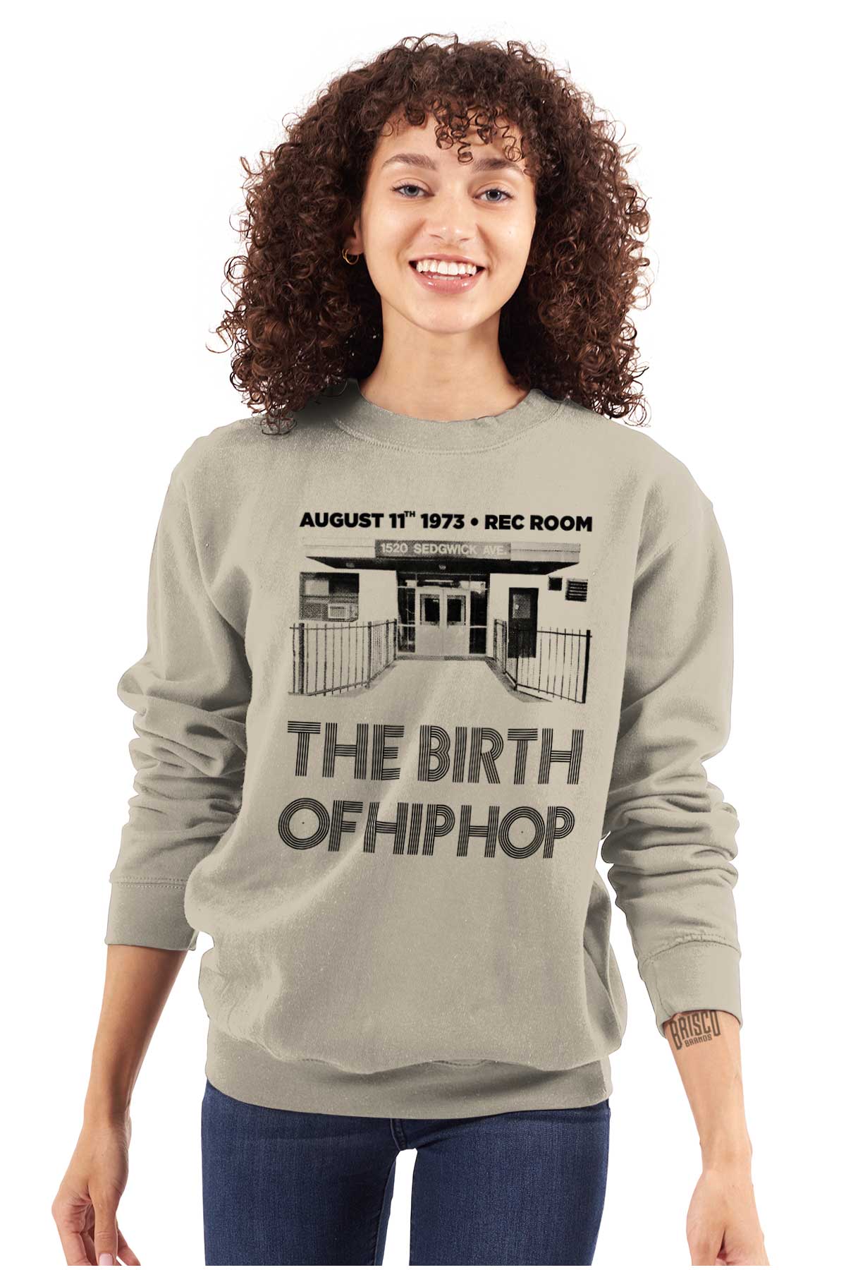 This image shows a sweatshirt that honors the birthplace of Hip Hop and the iconic moment when DJ Kool Herc brought music to life in 1973, allowing you to celebrate and proudly wear a piece of history.