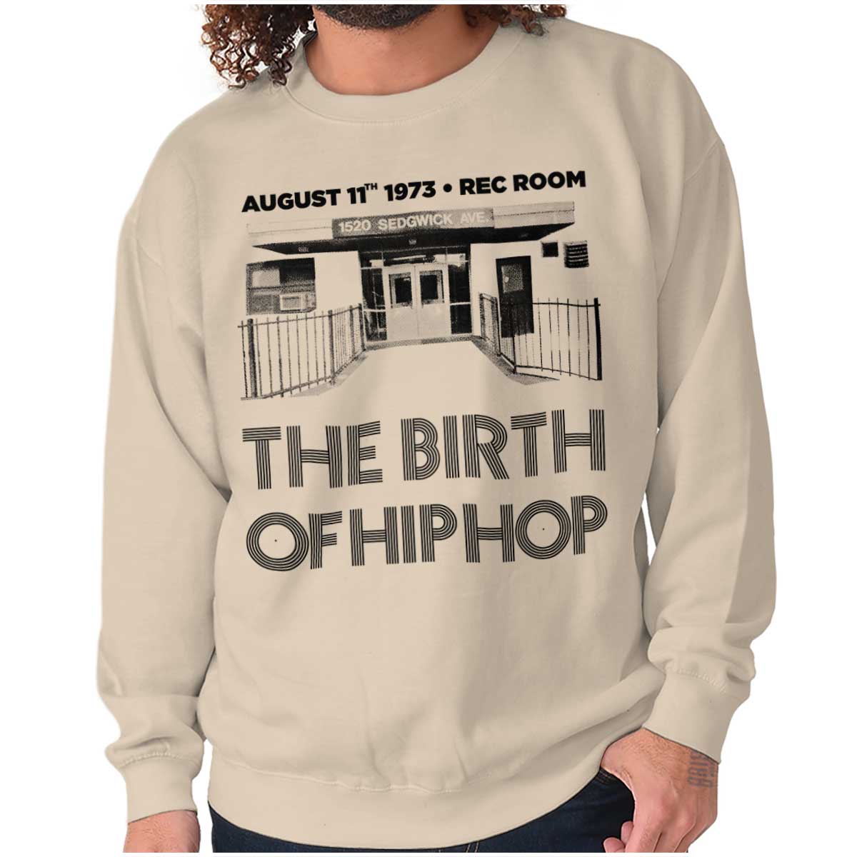 This image shows a sweatshirt that honors the birthplace of Hip Hop and the iconic moment when DJ Kool Herc brought music to life in 1973, allowing you to celebrate and proudly wear a piece of history.