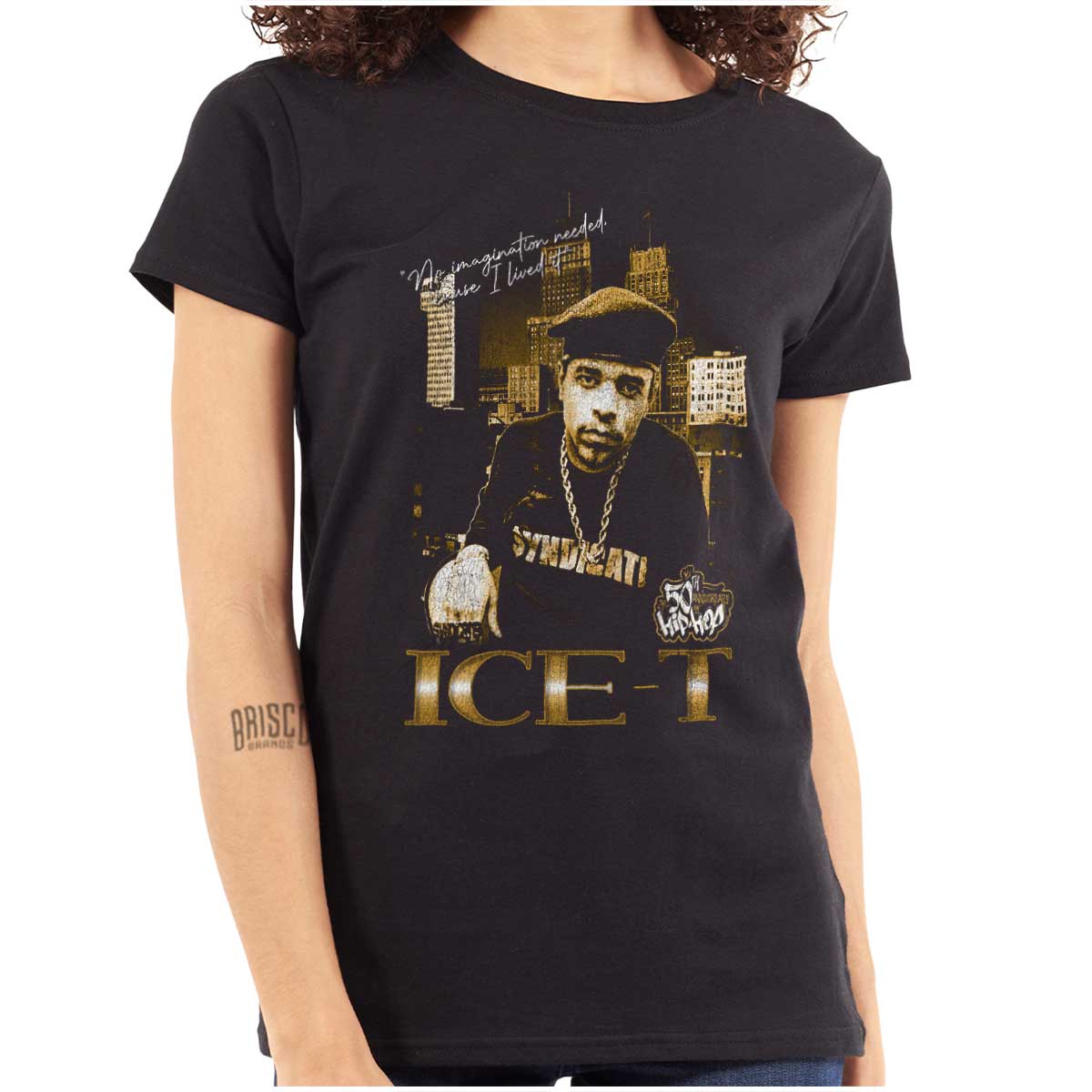 The image shows a confident ICE-T wearing chains in front of city skyscrapers, representing the bold and resilient essence of hip-hop and its legacy.